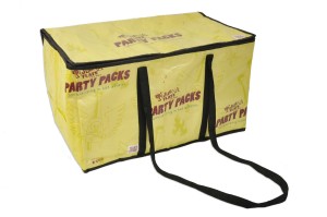 A large, rectangular yellow party pack bag with black handles and trim doubles as a stylish cooler. The bag features text that says Party Packs and includes decorative graphics.