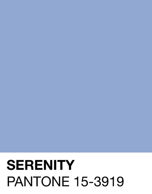 A sample of the color Serenity, Pantone 15-3919. Its a soft, calming shade of light blue presented in a square with the Pantone name and code written below.