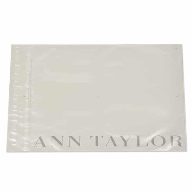 A transparent plastic bag with the brand name Ann Taylor printed in large, bold letters at the bottom. The bag is empty and laid flat on a white background.