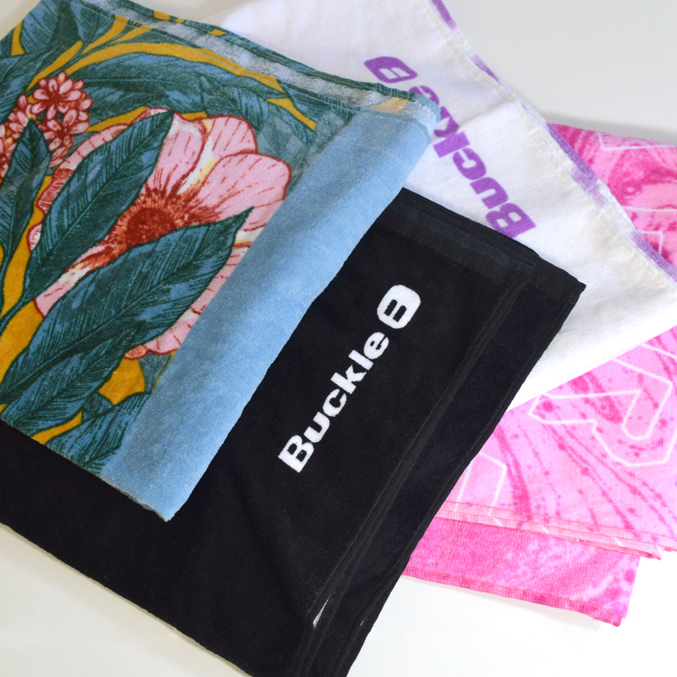 Buckle, water bottle holders, insulated coolers, insulated cooler bags, towels, promotional items, marketing items, gift with purchase, gift with purchase items, drawstring backpacks, gift with purchase packaging, promotional retail packaging