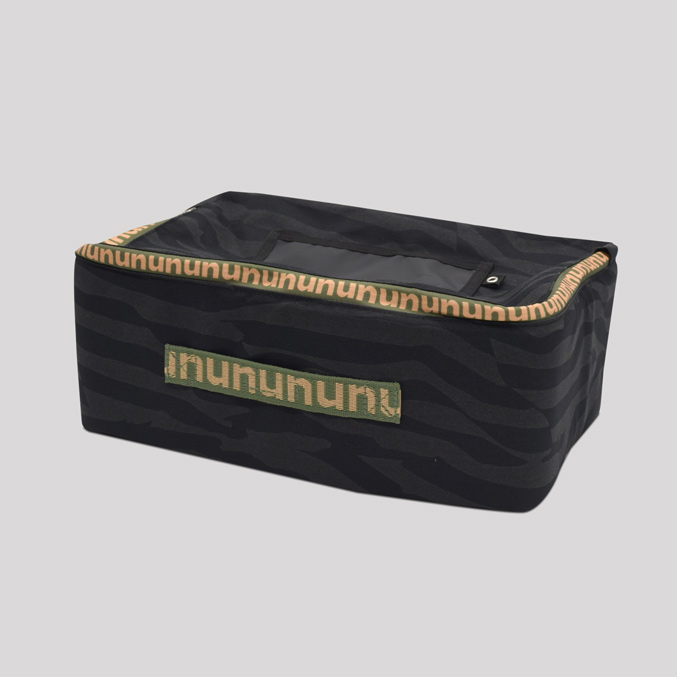 Black and olive green storage box with tiger stripe pattern and nununu logo on the side. The box is rectangular and has a handle on the top.