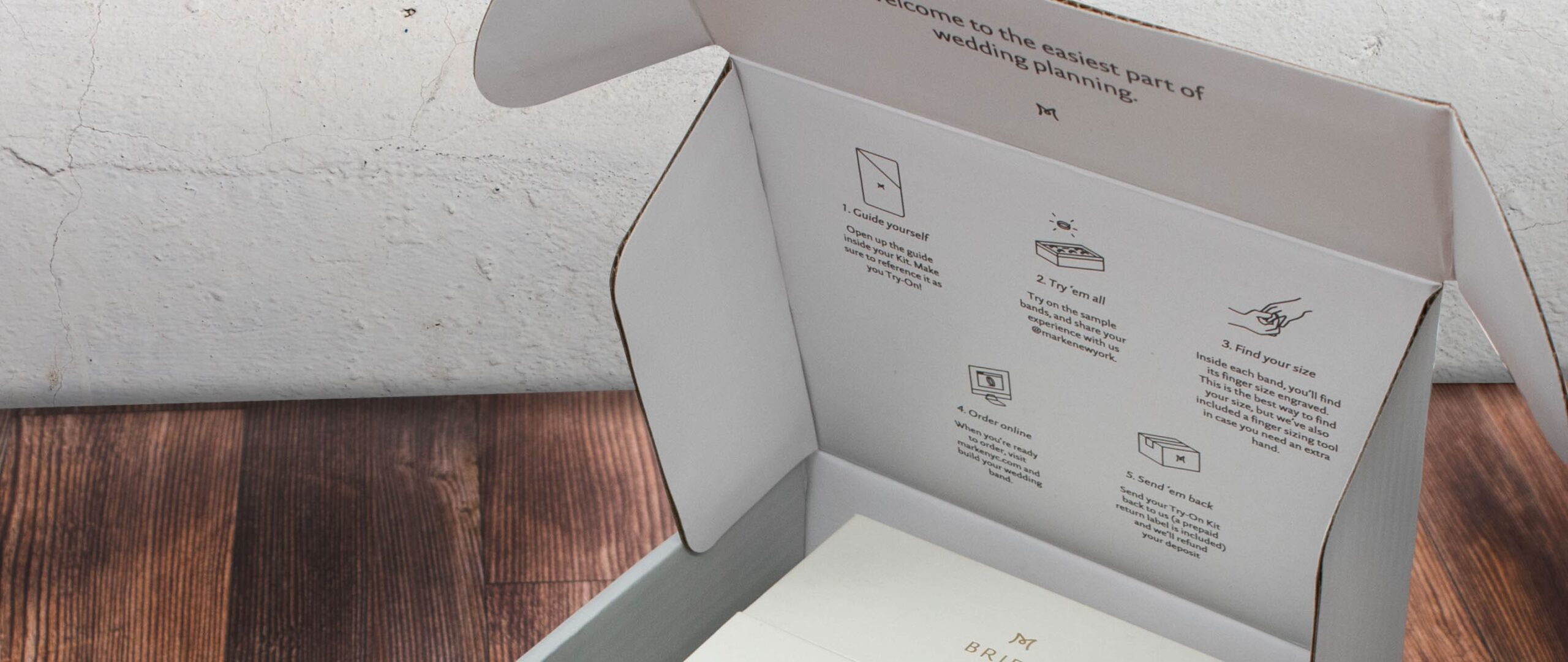 Inside flap on a Marke wedding band box